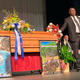 Attorney Ben Crump stands next to Hunter Brittain’s casket at the Beebe High School Auditorium before his memorial service in Beebe, Ark., on Tuesday, July 6, 2021. Brittain was shot and killed by a Lonoke County Sheriff’s deputy during a traffic stop June 23.